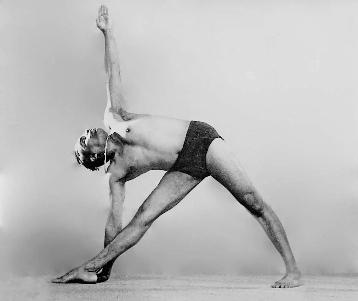 Photo of B.K.S. Iyengar in Utthita Trikonasana (Extended Triangle Pose)